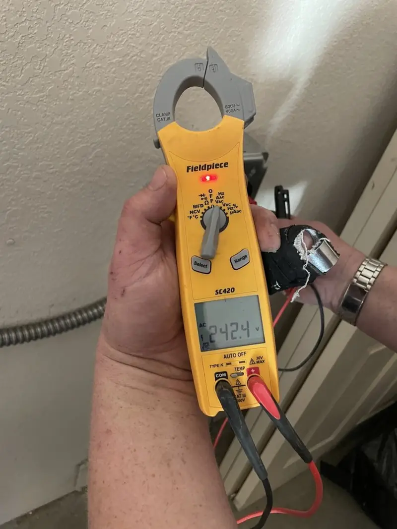 Voltage testing with clamp meter during Generator Installation in Washington